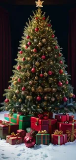 Decorated Christmas tree with gifts on snow-filled base.