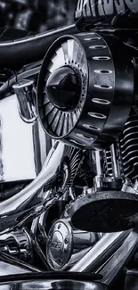 Close-up of a chrome motorcycle engine in artistic black-and-white style.