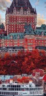 Château Frontenac with autumn foliage and river view.