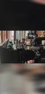 Professional camera on a film set capturing a scene.