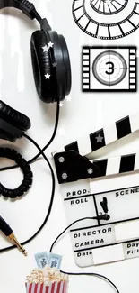 Minimalistic wallpaper with headphones and movie clapperboard.