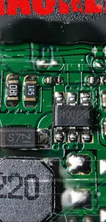 Close-up view of a circuit board with green and silver elements.