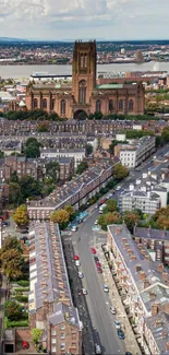 Aerial view of city with prominent cathedral and surrounding streets.