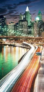 City skyline at night with light trails.