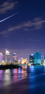 Beautiful city night skyline with reflections on water.