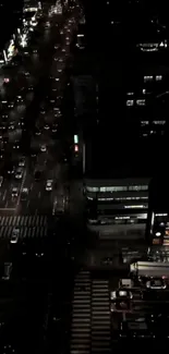 Night-time city traffic view with illuminated streets.