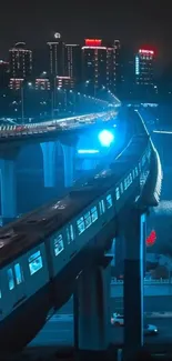 Night train crossing a city bridge under blue lights.