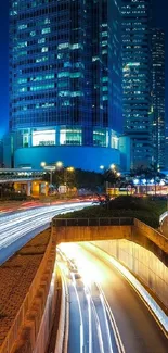 City nightscape with glowing traffic and skyscrapers.