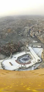 A panoramic aerial view of a cityscape featuring a prominent mosque.