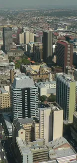 Aerial view of a bustling urban city skyline with various buildings.