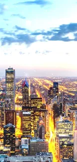 Vibrant city skyline at dusk with glowing urban lights and a blue sky.