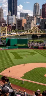 Baseball stadium with city skyline, under a clear blue sky.