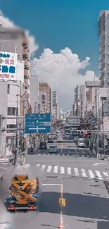 Urban street view with buildings and cars under a bright sky.