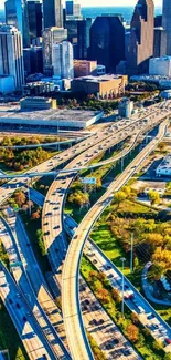 Aerial view of bustling city highways with a vibrant skyline.