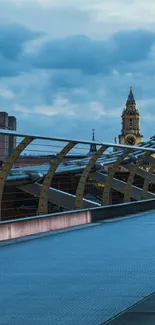 Cityscape and bridge view with dramatic evening sky.