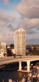 Scenic city skyline with bridge at sunset, capturing urban elegance.