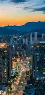 Illuminated cityscape with skyscrapers at sunset.