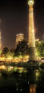 Vibrant cityscape at night with reflections on water.