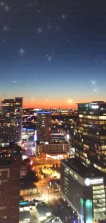 Cityscape at dusk with a starry night sky and glowing city lights.