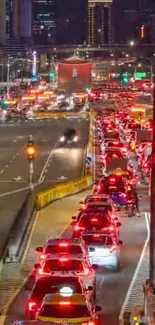 City traffic at night with vibrant red lights.