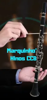 Clarinet being played on a dark background.