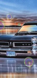 1965 GTO classic car with sunset reflection.