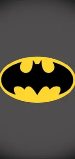 Dark gray wallpaper with Batman logo in yellow and black.