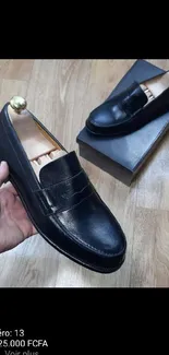 Classic black leather loafers with elegant design.