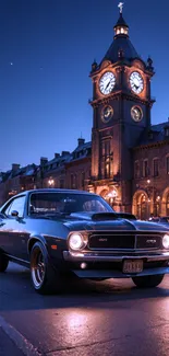 Classic car under clock tower in twilight cityscape.