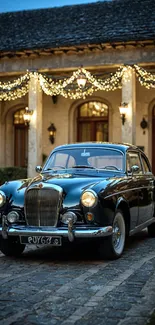 Vintage car with festive lights outside an elegant building.