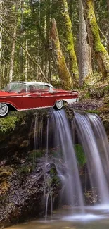 Classic red car perched above a scenic forest waterfall.