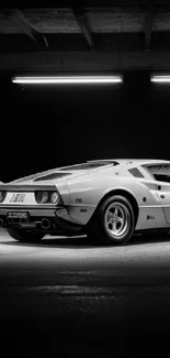 Classic sports car parked in a dimly lit garage, evoking a noir atmosphere.