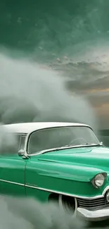 Vintage green car driving through mist at sunset.