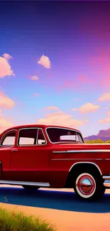 Vintage red car under a vibrant sunset sky.