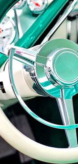 Mint green classic car steering wheel with chrome details.