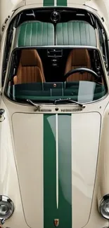 Overhead view of vintage convertible car with green racing stripes.