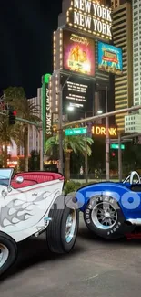 Classic cars in a vibrant Las Vegas night setting.