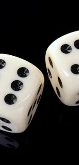 Minimalist wallpaper with white dice on a black background.