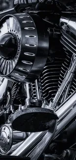 Close-up of a classic motorcycle engine in black and silver tones.