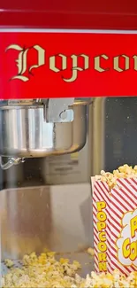 Retro popcorn machine with popcorn box.