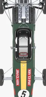 Overhead view of a classic green race car with number five.