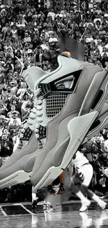 Iconic sneakers with a cheering crowd background.