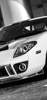 Black and white classic sports car close-up wallpaper.