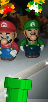 Mario and Luigi figurines with pixel art.