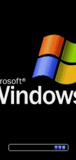 Retro Windows logo wallpaper with a black background and colorful emblem.