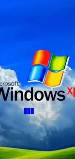 Classic Windows XP logo with clouds and sky wallpaper.