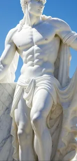 Classical marble statue under a blue sky, ideal for art-themed phone wallpaper.