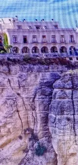 Cliffside building with scenic view and architecture.