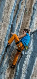 Daring climber scales rugged rock face.