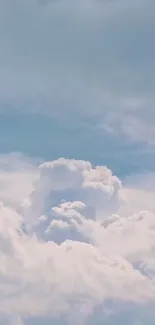 Light blue sky with fluffy white clouds.